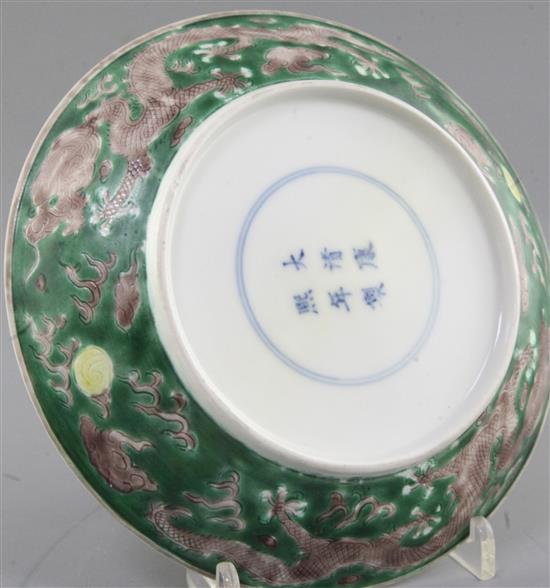 A Chinese Susancai dragon saucer dish, Kangxi mark and of the period (1662-1722), diameter 19.2cm, restored